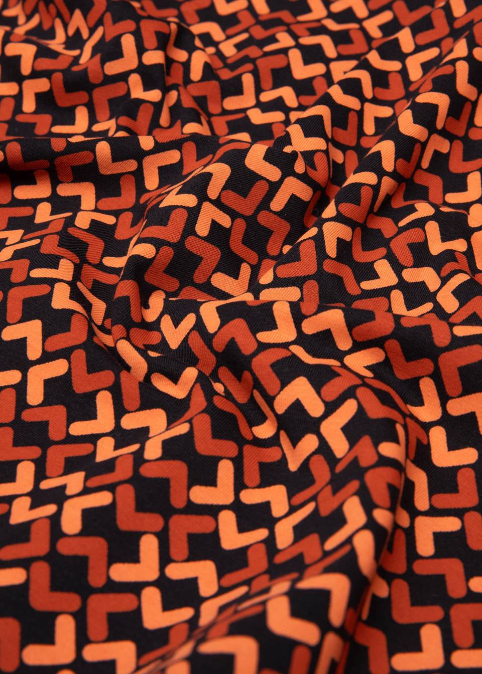 Blutsgeschwister Shirt "Radiant Rebels Crew" orange/schwarz gemustert